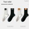 Autumn Trend Solid Color Mid-Calf Women's Socks with Smiley Face Leather Label - Black & White