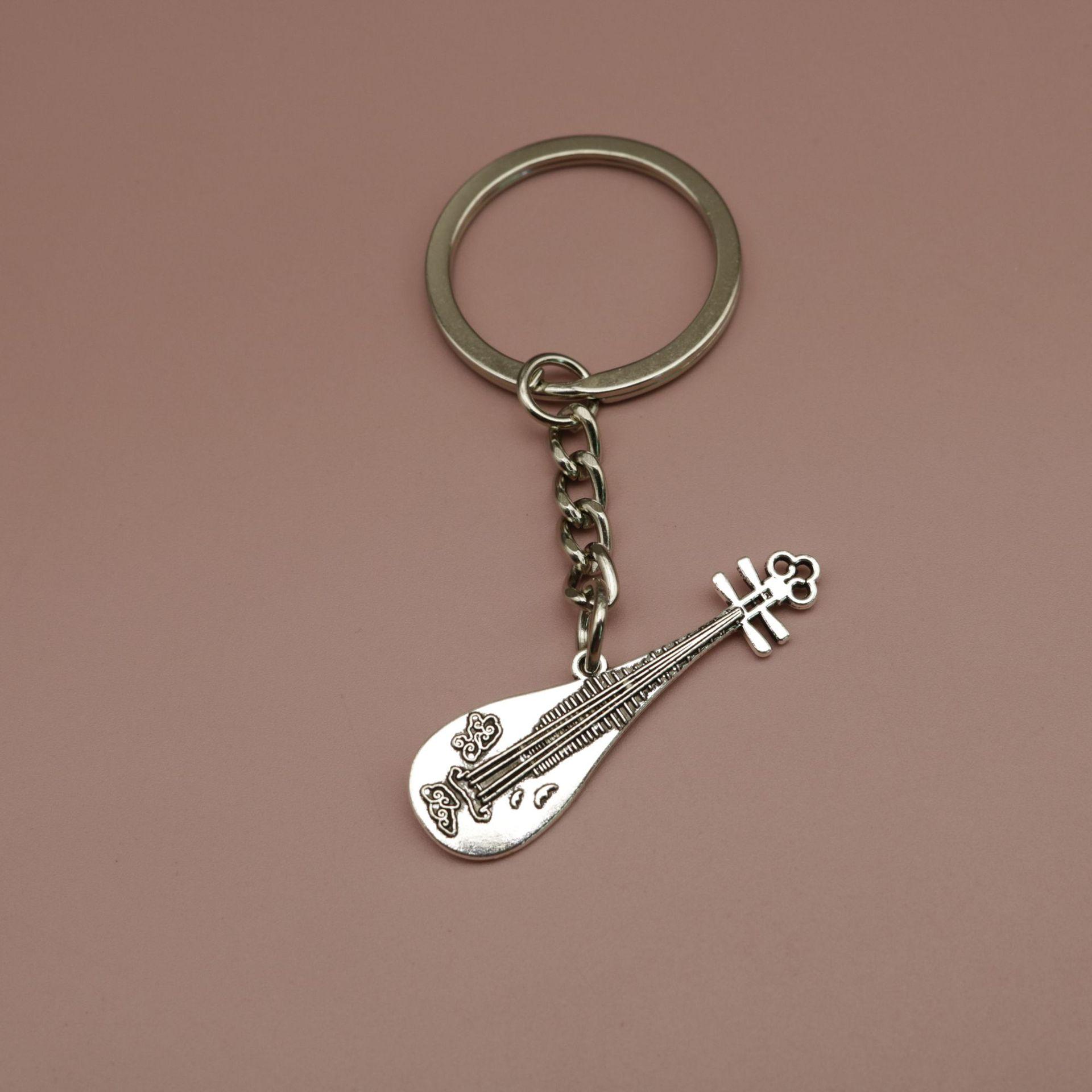 Guitar Pipa Musical Instrument Keychain Pendant серебряный
