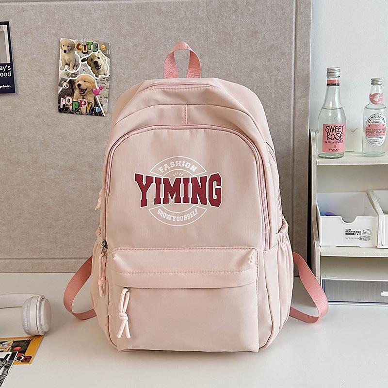 

New schoolbag junior high school girls high value college students simple solid color backpack women s leisure travel backpack