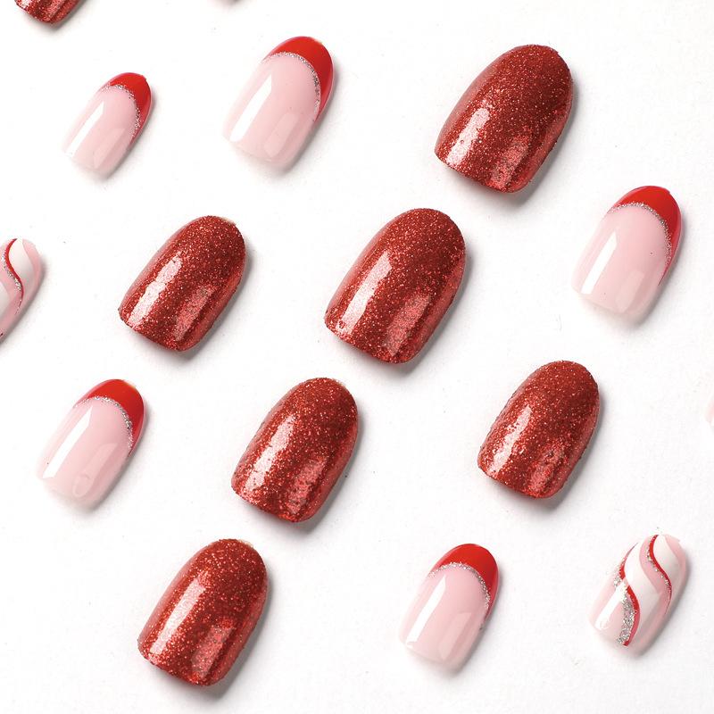 Red glitter Christmas manicure wearing silver pink white red contrasting color wavy nail wearing nail autumn and winter