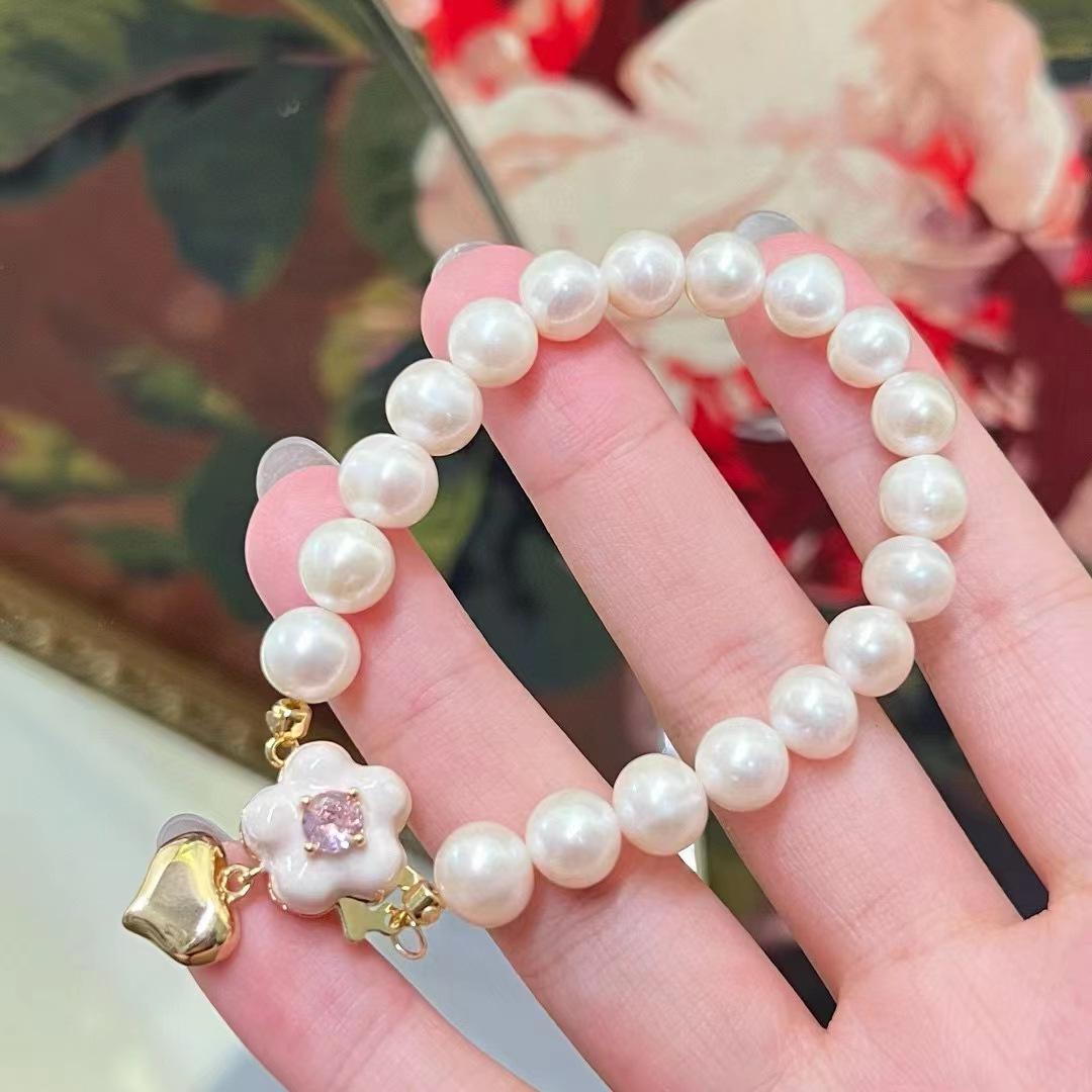 

Light luxury niche freshwater pearl love buckle bracelet women s 8-9mm strong light new Chinese bracelet hand jewelry natural pearl білий