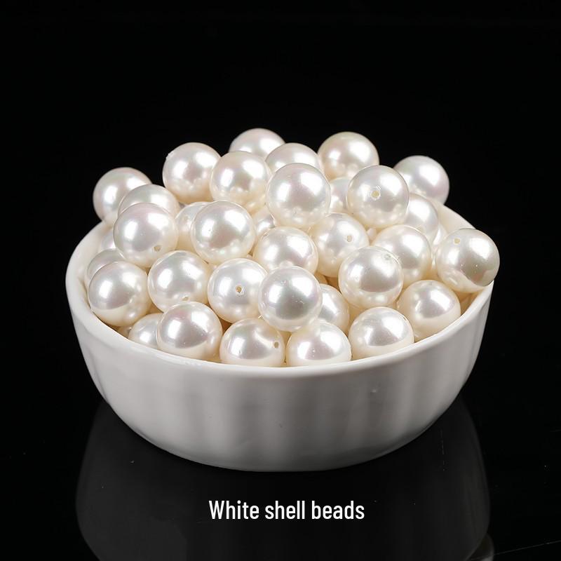 

Комплект женского браслета и ожерелья из белых ракушечных бусин White Shell Beads 12mm/30 pcs