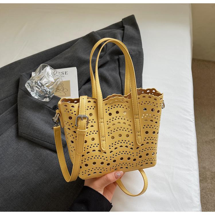 High-end carved hollow portable small bag women's 2025 new fashion texture bucket bag single shoulder messenger bag tide
