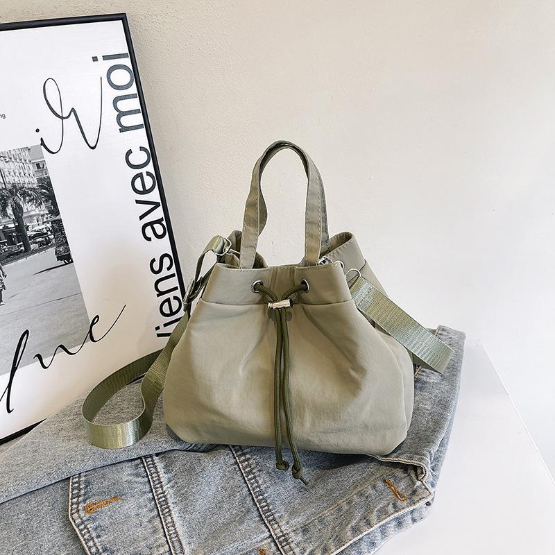 Casual Niche Drawstring Hand-held Bucket Bag Crossbody Bag for Women 2026 New Trendy Versatile Simple Small Bag Cloth Bag