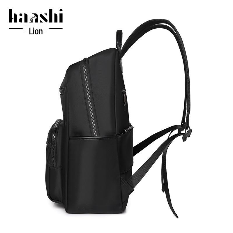 High-End Casual Waterproof Nylon Backpack: Fashionable, Lightweight Travel Bag for Men & Women, with Shoulder Straps & Laptop Compartment.