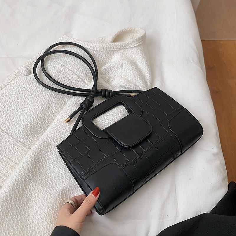 Elegante tekstur damevesker allsidige skulder-crossbody-vesker feminine jobb- og crossbody-pendel-vesker monokrome og retro nye