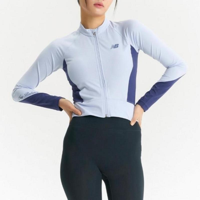New Balance Women S eSSentialS Zip Up raSh Guard Nbmde2w702