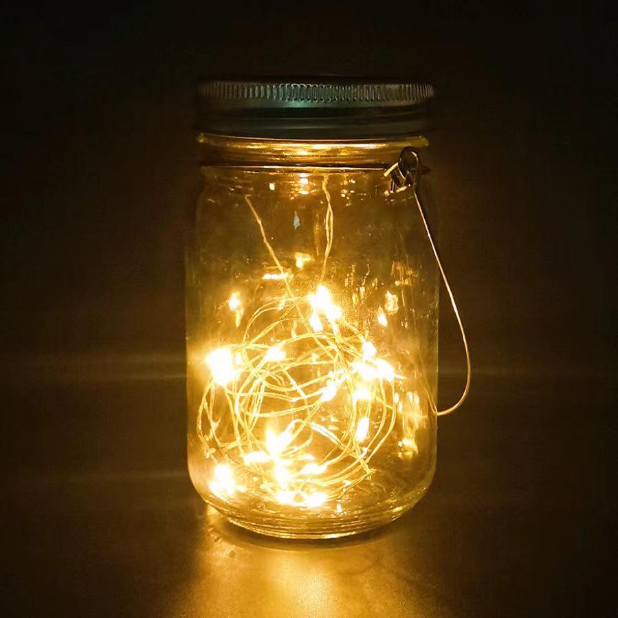 Rainproof Solar Mason Jar Wish Light for Garden, Balcony, and Villa Decor.