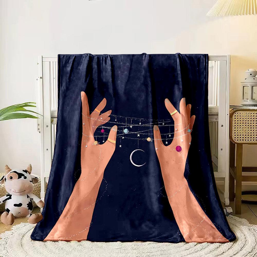 Hands delicately holding strings adorned with stars, planets, and a crescent. for all seasons blanket lunch break throw gift 80cm x 120cm