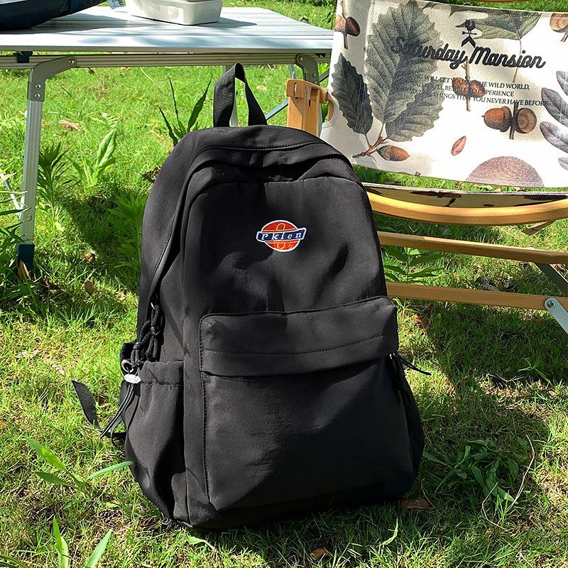 Backpack New large-capacity backpack Junior high school student high-value schoolbag Anti-theft simple student schoolbag