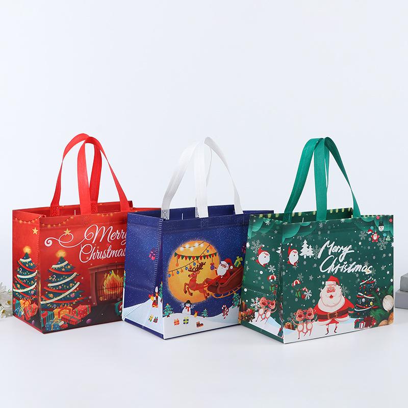 1pcs Christmas Gift Bag Santa Claus Non-woven Candy Gift Packaging Tote Bag Christmas Party Supplies Happy New Year