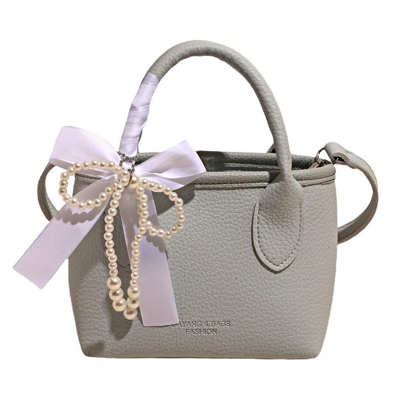 Niche design portable bucket bag women's 2025 new spring and summer bag shoulder messenger bag tide