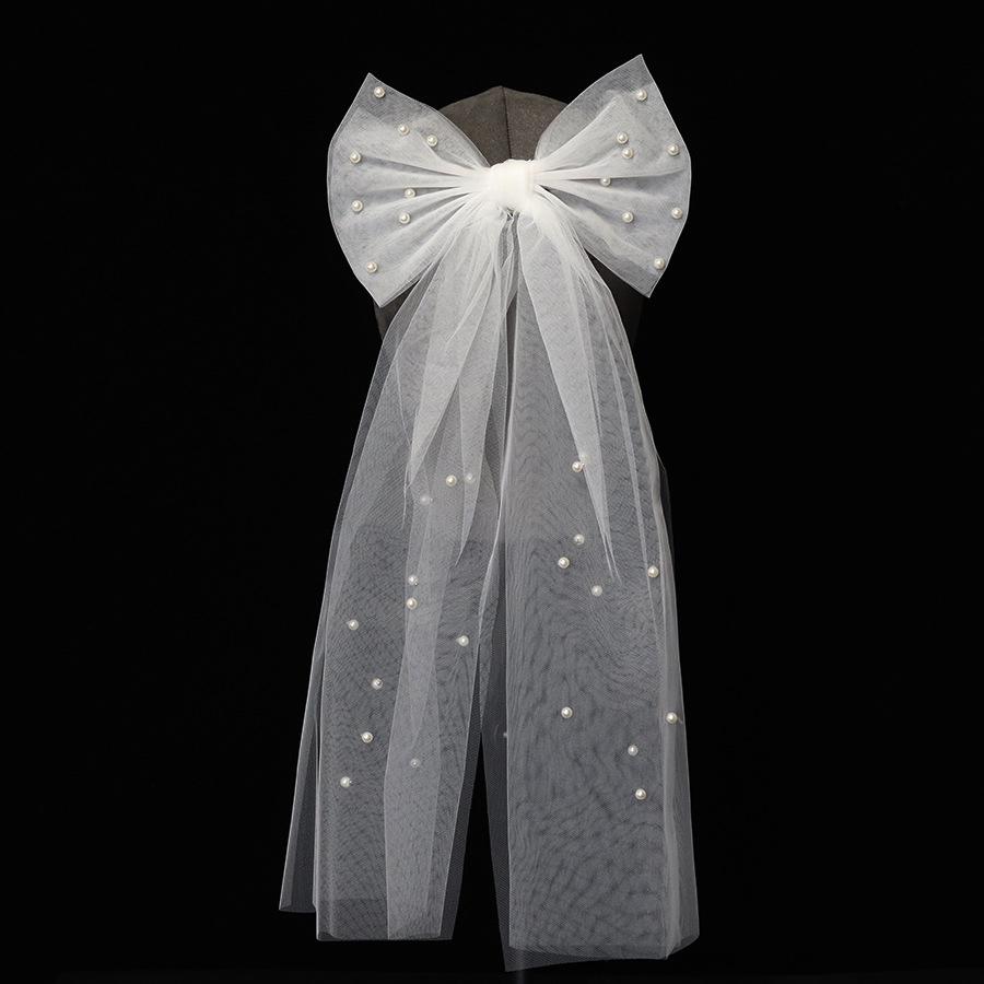 

Двухслойная фата-клипса с жемчужным бантом для помолвок и свадеб