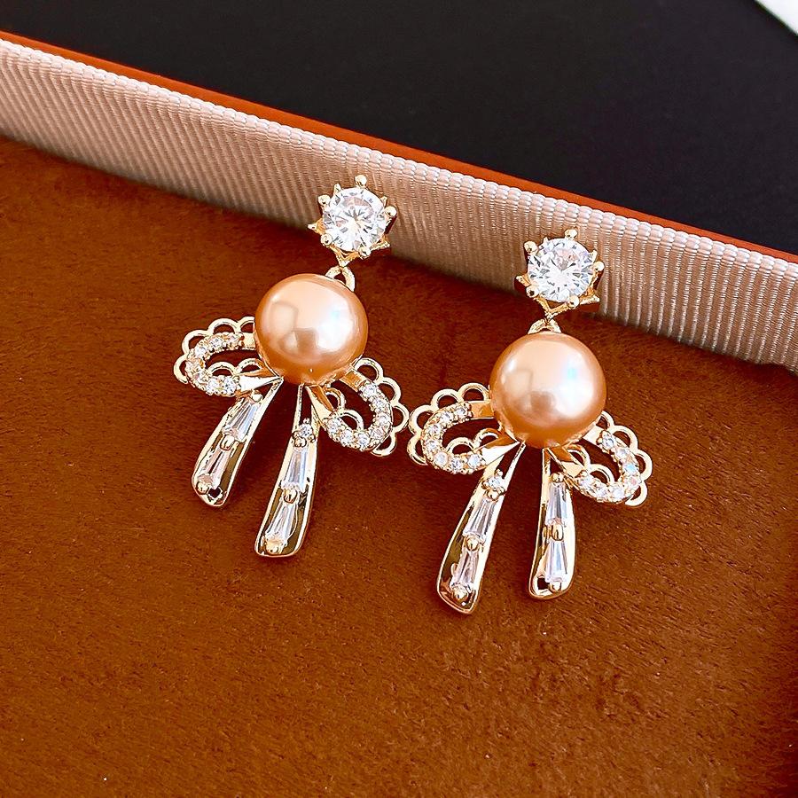 Korean sweet zircon bow pearl earrings, stud earrings, exquisite versatile earrings.