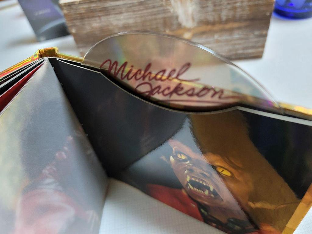 [USED] Thriller 25th Anniversary Edition, OFF THE WALL, and 3 Moonwalker DVDs.