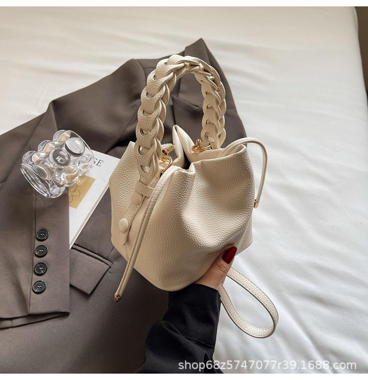 

Portable bucket bag 2025 summer new Korean version of the yozi texture soft leather lychee pattern large-capacity one-shoulder crossbody bag