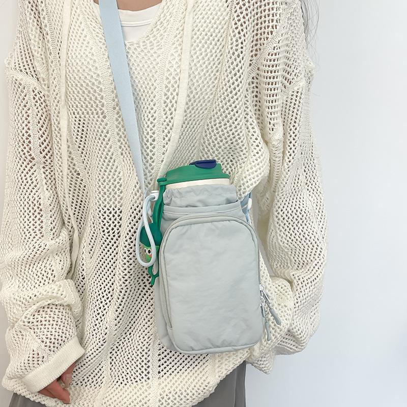 Crossbody bag women's new Korean version of simple solid color small square bag casual versatile mobile phone bag student water cup bag tide