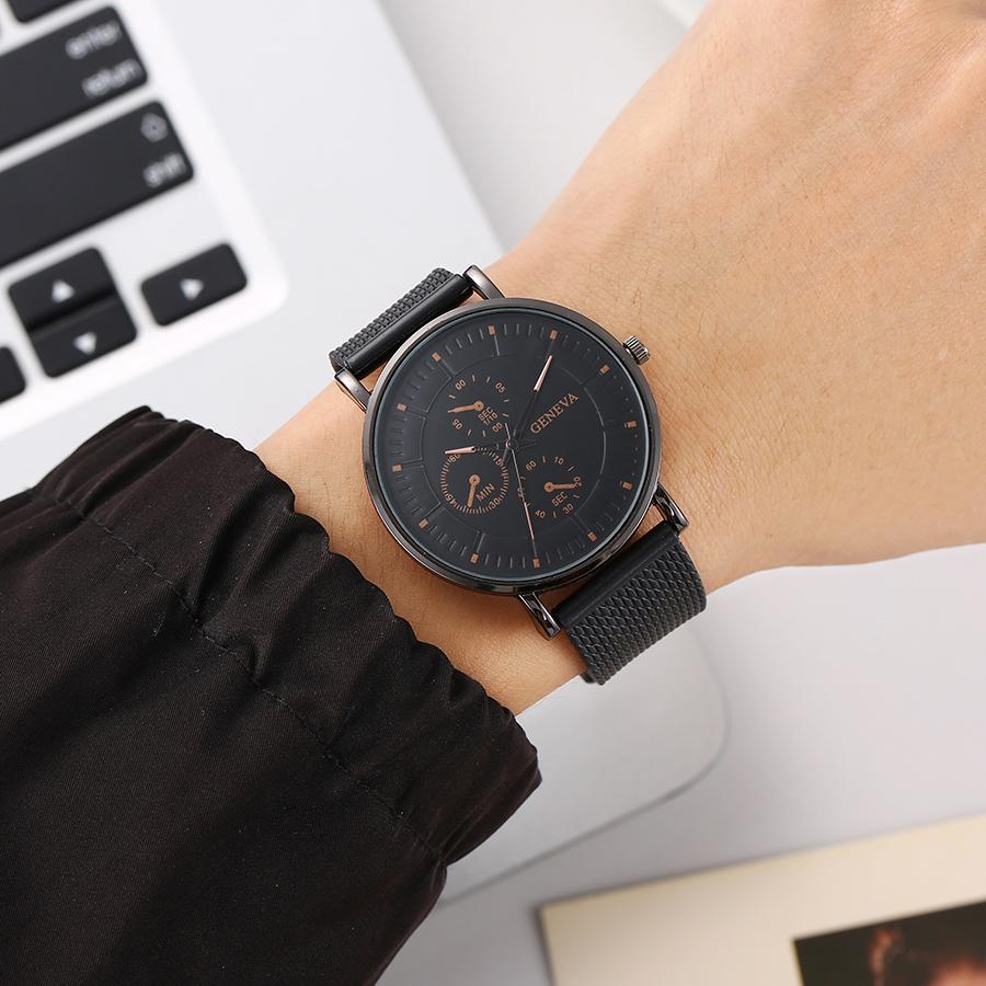 New trend fashion temperament high sense round plate rivet scale steel strap men's quartz watch student party