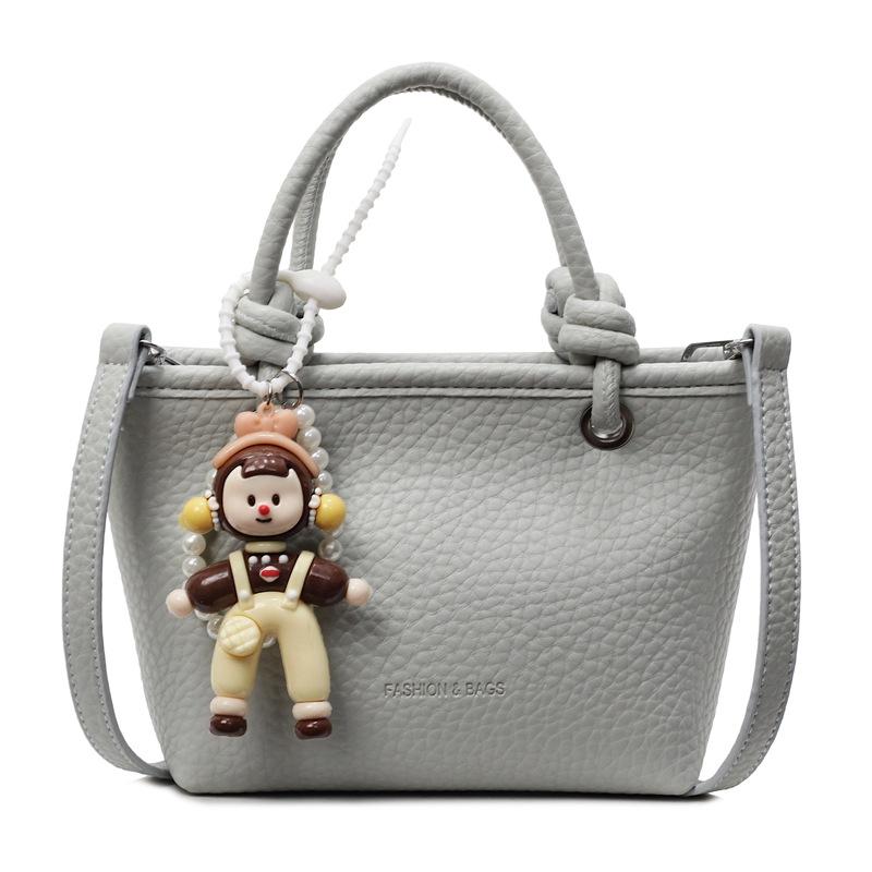 Fashion high-end hand bucket bag spring and summer simple and versatile shoulder bag trendy niche messenger bag