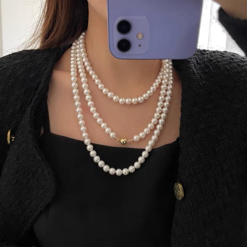 New personality fashionable temperament multi-layer stacked magnetic buckle pearl necklace long light luxury sweater chain accessories neck chain