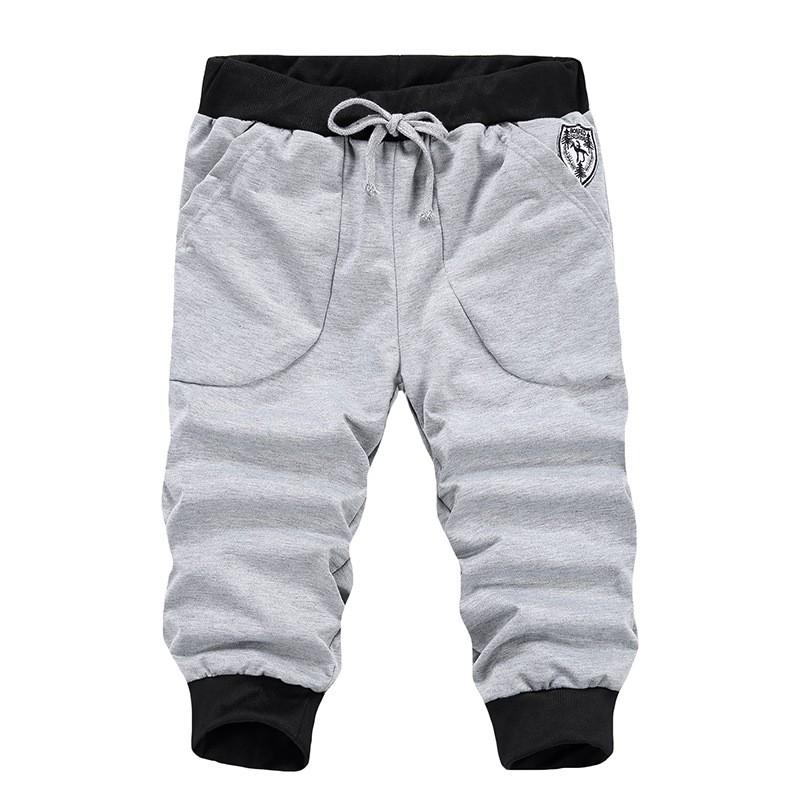 Mens Slim Fit 7/8 Length Casual Pants Solid Color Cotton Blend Stretch Trousers Youth