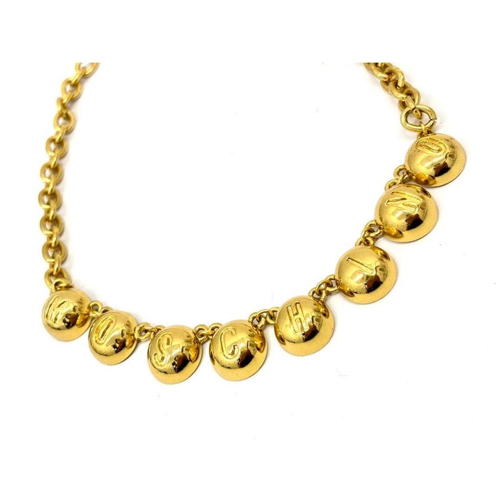 Used Moschino gold color necklace with logo charm vintage