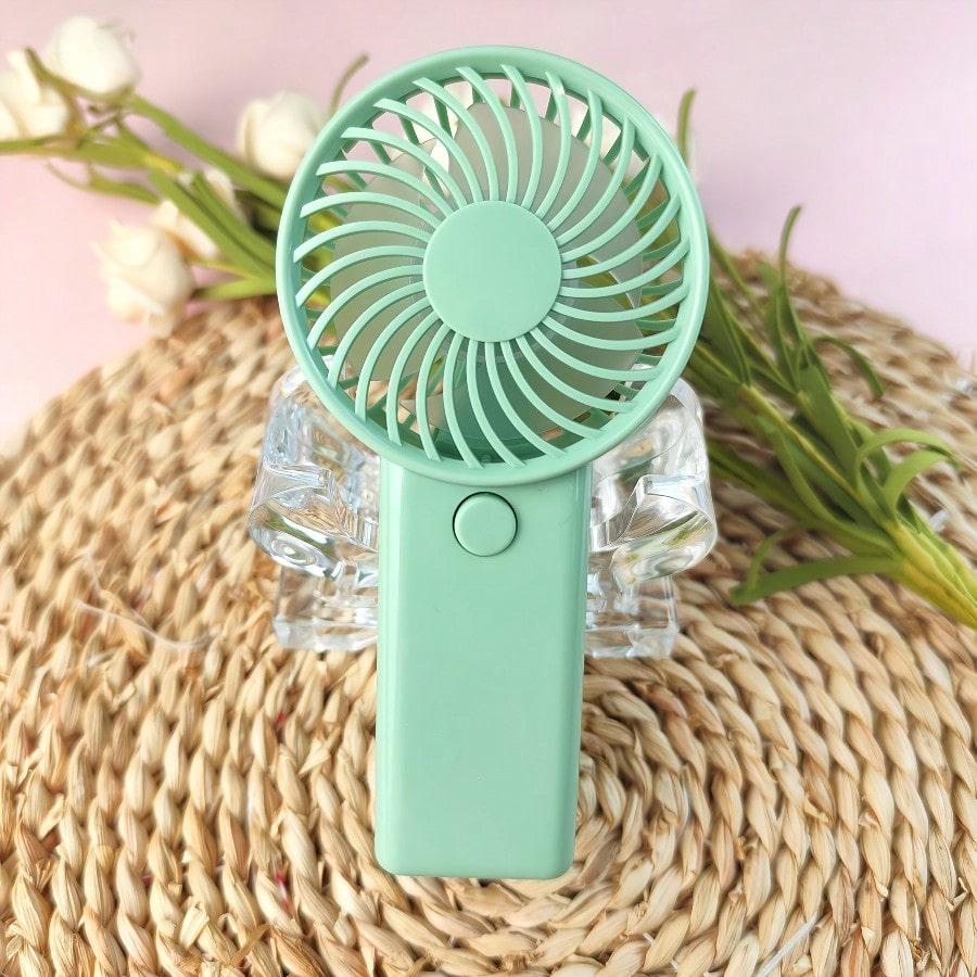 1pc Mini Handheld Fan - Portable Lightweight Battery-Powered Cooling Fan with High-Speed Quiet Operation