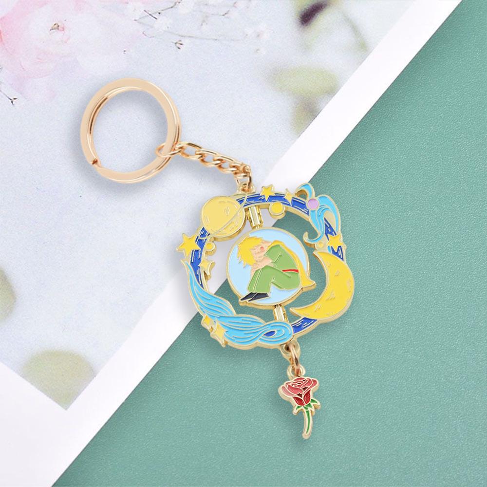Breloc Planetă Micul Prinț cu Pandantiv Trandafir – Accesoriu de Modă Metalic Rotativ Creativ