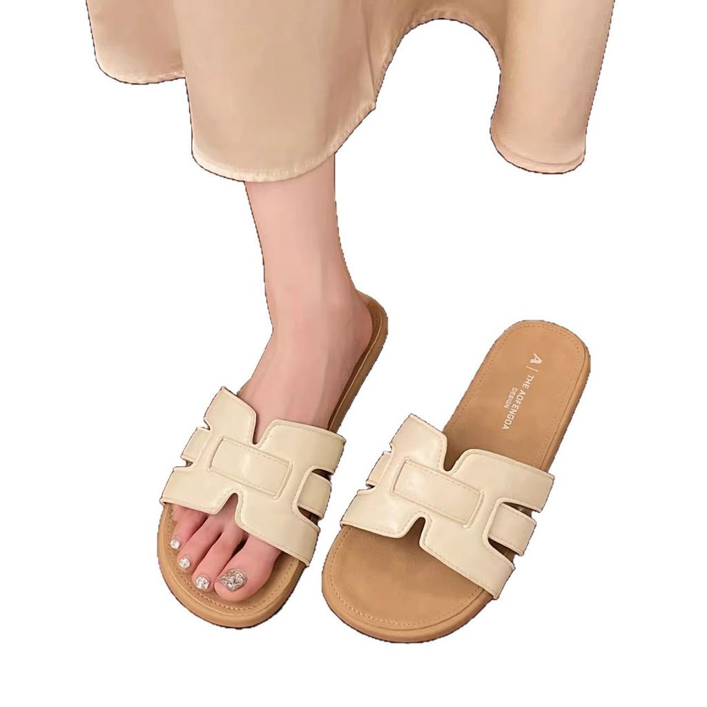 French flat-bottomed slippers women's summer wear 2025 new Internet celebrity fashion retro woven soft bottom word beach sandals
