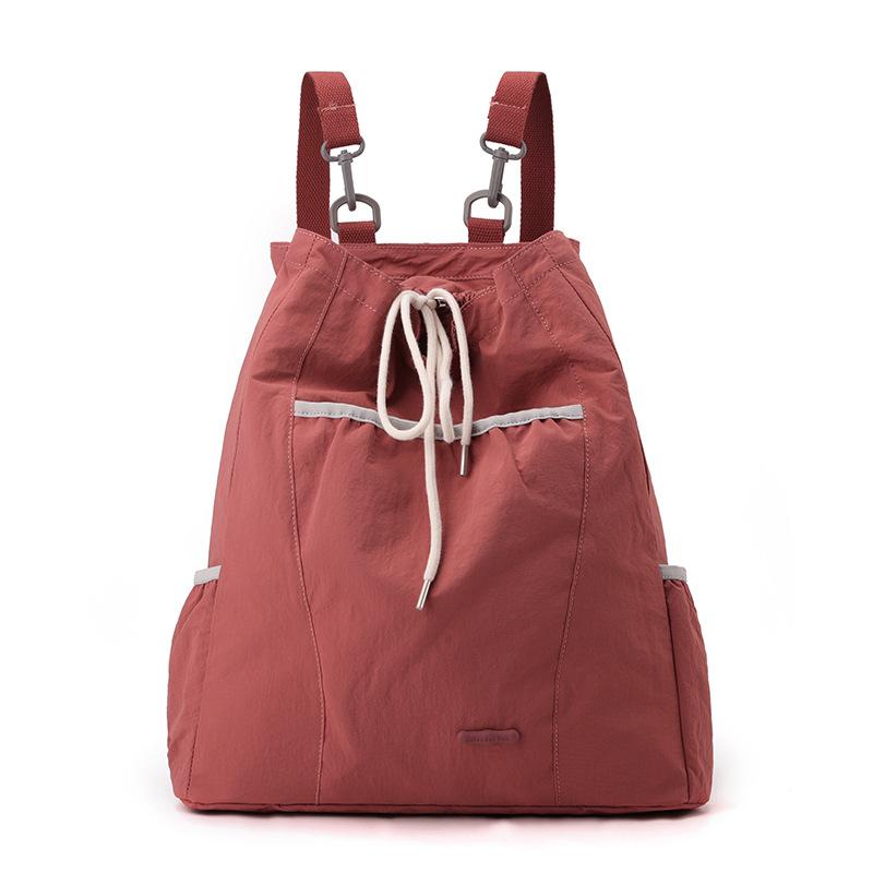 Niche design women's casual backpack college wind lightweight drawstring backpack