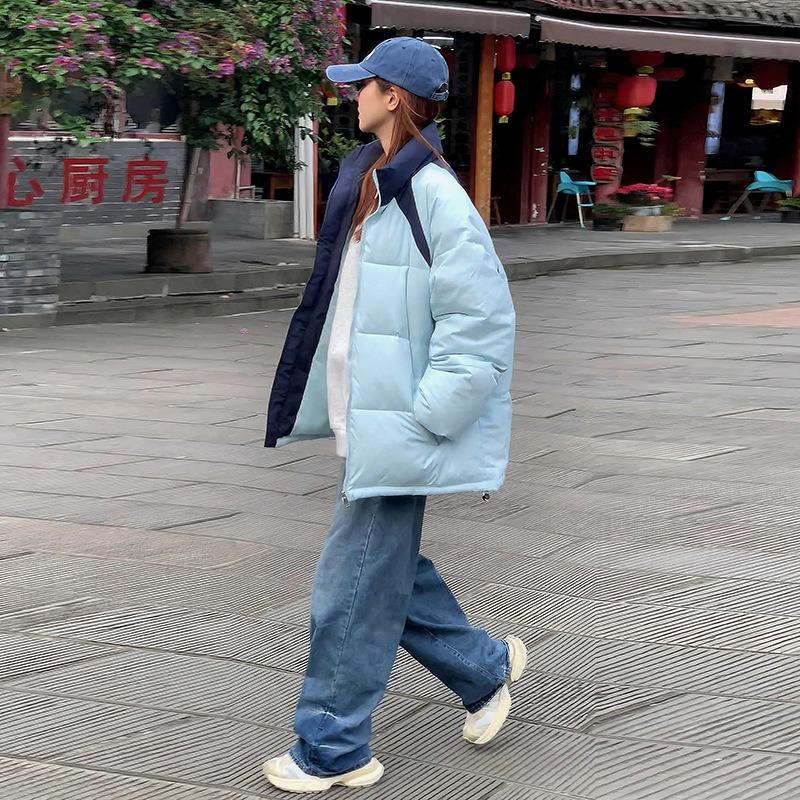 Wear stand-up collar cotton-padded clothes, women's winter thick coats, new men's and women's cotton-padded jackets, and bread clothes are trendy.