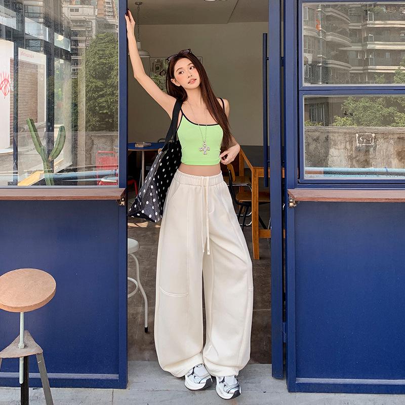 

Spring 2026 Women s Elastic Sports Pants: Ideal for Pear-Shaped Figures with a Relaxed Wide-Leg Design. Medium