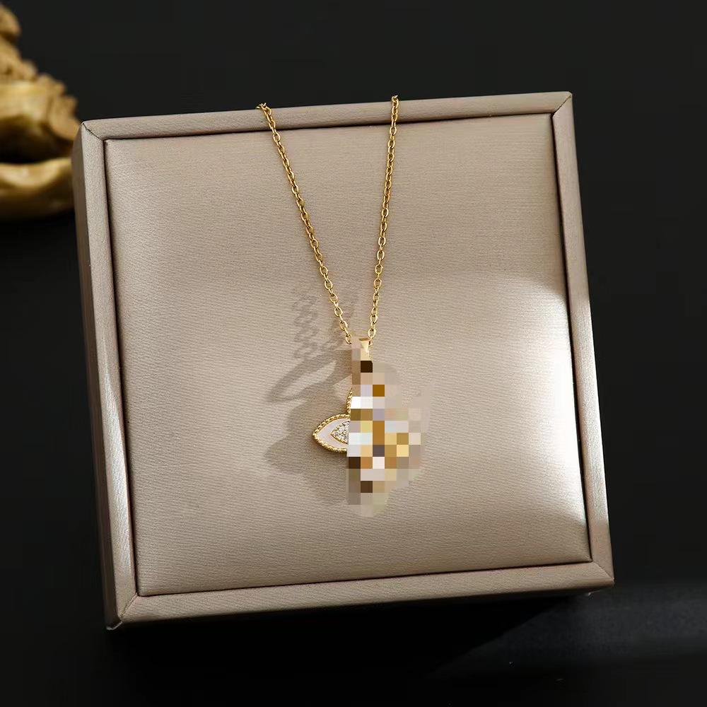 Elegant Gold-Plated Chinese-Style Four-Leaf Clover Necklace with Imitation Hetian Jade Pendant for Women