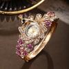 Ladies Peacock Stone Quartz Watch With Hollow Flower Alloy Bracelet For Fashion Accessory