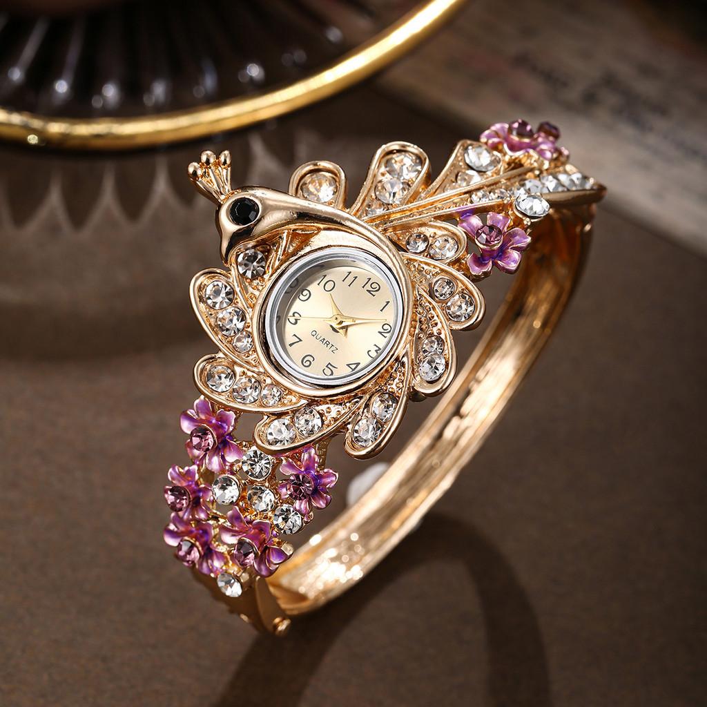 Ladies Peacock Stone Quartz Watch With Hollow Flower Alloy Bracelet For Fashion Accessory
