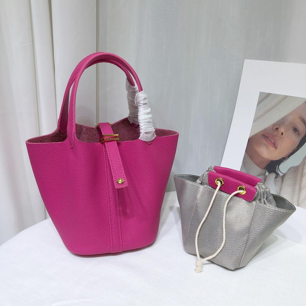 Spot wholesale top layer cowhide vegetable basket bag leather bucket bag commuter fashion lock buckle hand-held handbag woman