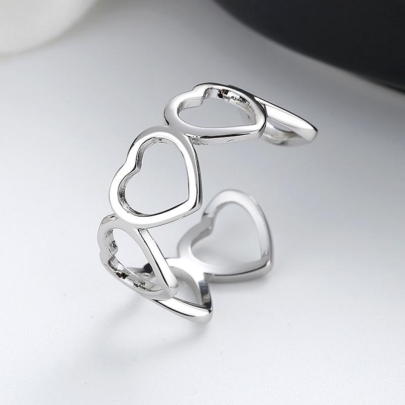 

Трендовое кольцо с полым сердцем - Модный простой дизайн для женщин, Открытый стиль для указательного пальца Adjustable платиновый