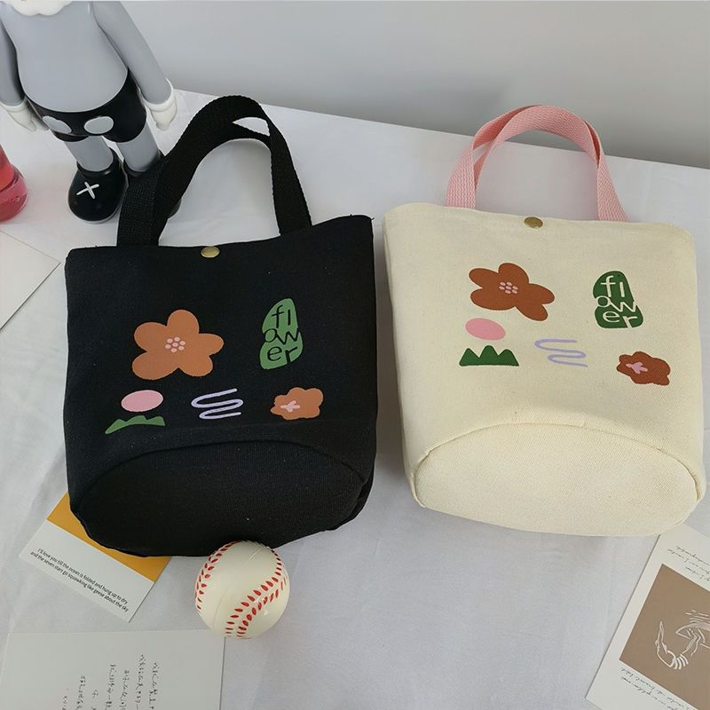 Damenhandtasche aus Canvas mit Nischendesign und Aufdruck, zum Mitnehmen von Lunchboxen, Bento-Stoffbeutel, einfache, vielseitige Einkaufstasche im literarischen Eimer-Stil