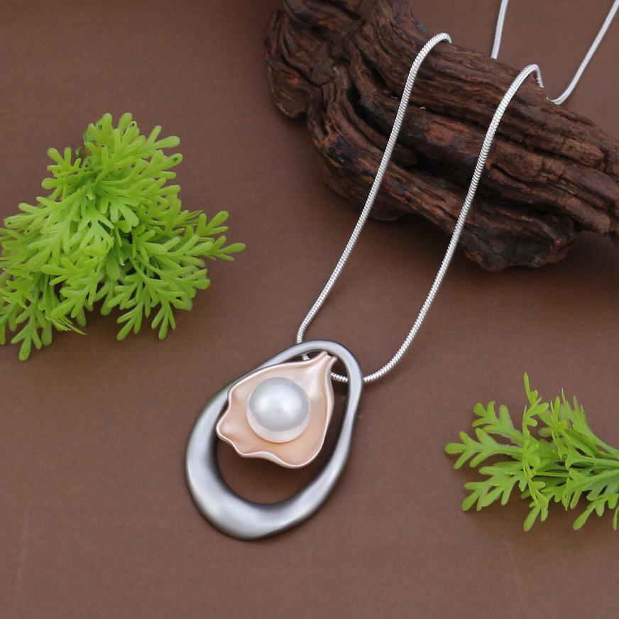 

New hollow matte pearl shell long pendant women s fashion high sense geometric shell long necklace