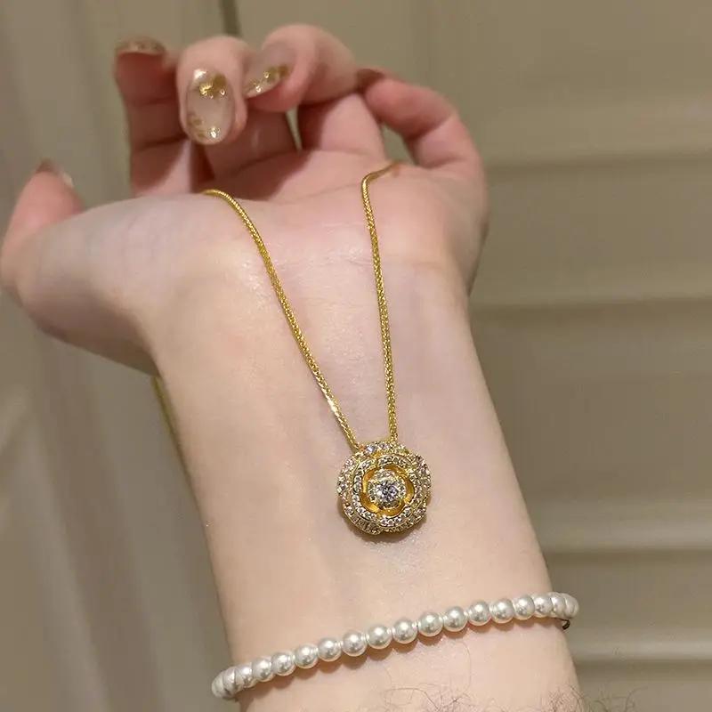 Exquisite and dazzling rotatable camellia flower necklace new in diamond inlaid elegant pendant fashion wedding