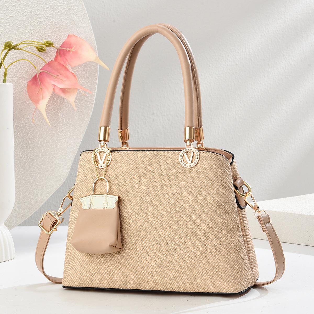 

Latest Design Macaron Splicing Handbag Top Appearance Level Standard Simple Atmosphere Shoulder Bag with Large Capacity Crossbody Bag .