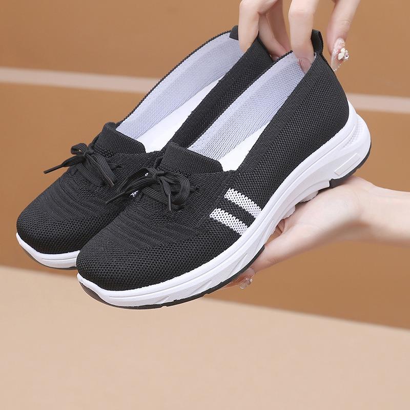Women's new flying woven fabric surface breathable one-pedal lazy shoes shallow mouth soft sole comfortable and light casual flat-soled single shoes
