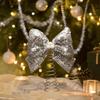 Large Shiny Sequin Bow Christmas Tree Topper with Spring Base
