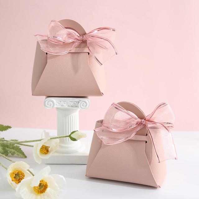 10 pezzi distribuiscono sacchetti regalo in pelle rosa, bomboniere per ospiti, mini borsetta con nastro, scatola per imballaggio di caramelle, decorazioni per feste