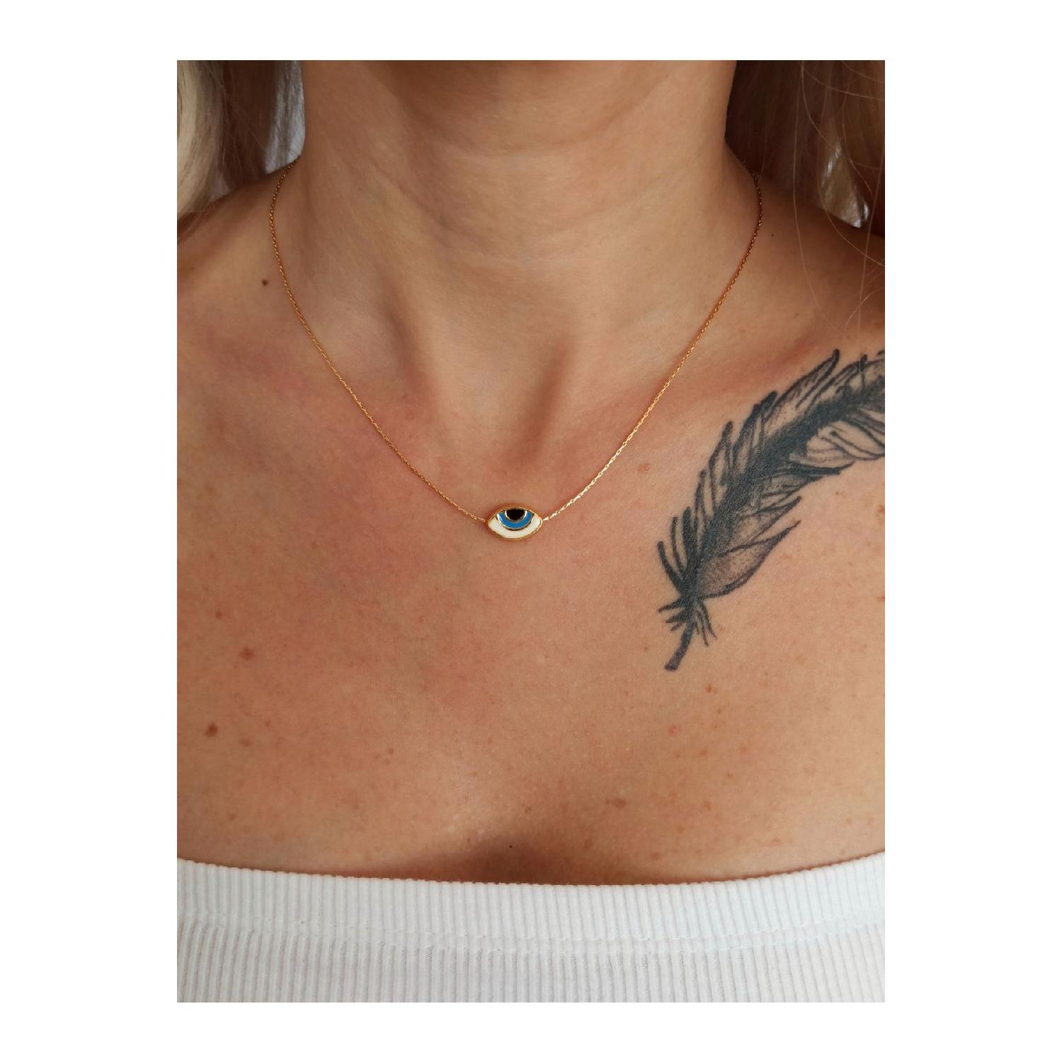 

Модель намиста Evil Eye із бісером золотий