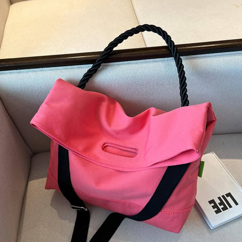

Жіноча сумка великої місткості Нова студентська сумка 2024 р. Полотняна сумка через плече з нейлонової тканини Портативна сумка для приміських поїздок рожевий
