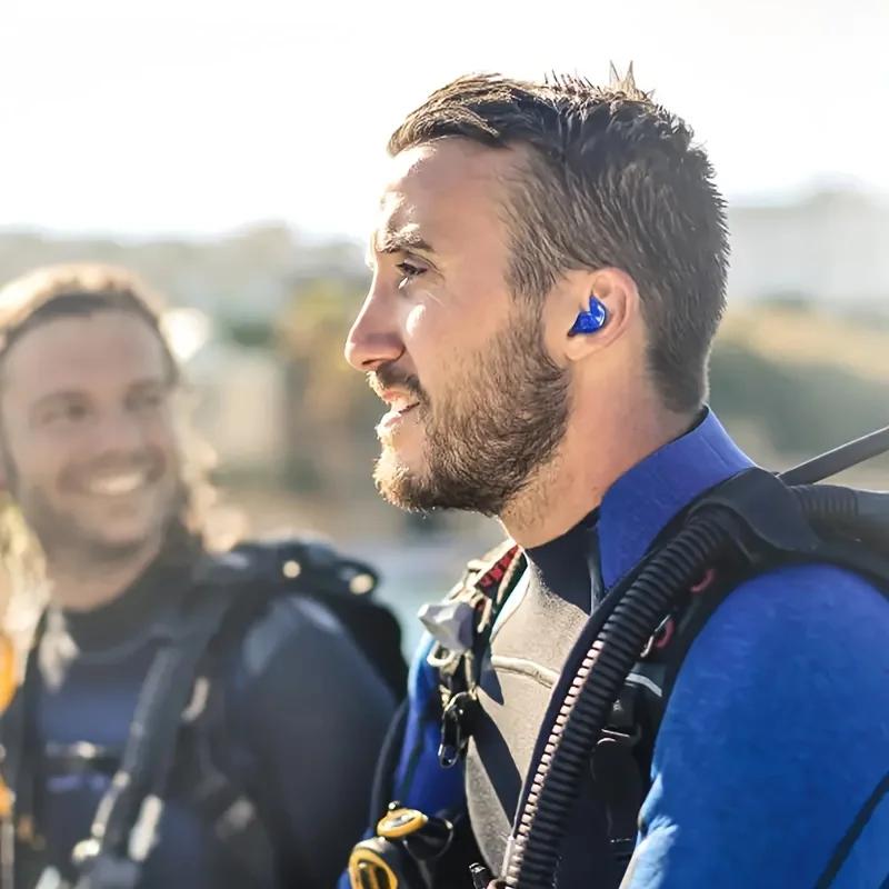Latest Models A Pair Of Reusable Swimming Earplugs For Swimming, Surfing, And Snorkeling. Available In A Variety Of Colors.
