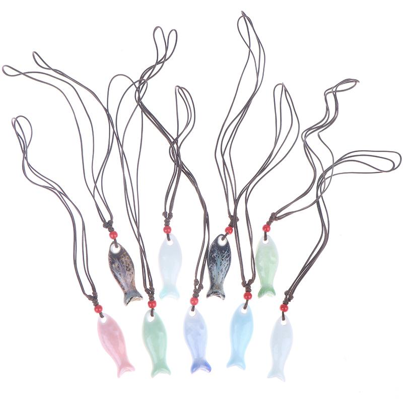 Collane Ciondolo Fischietto Pesce in Ceramica Stile Cinese Fischietto Fatto a Mano Liscio Collana con Fascino Delicato Catena per Maglione Unisex