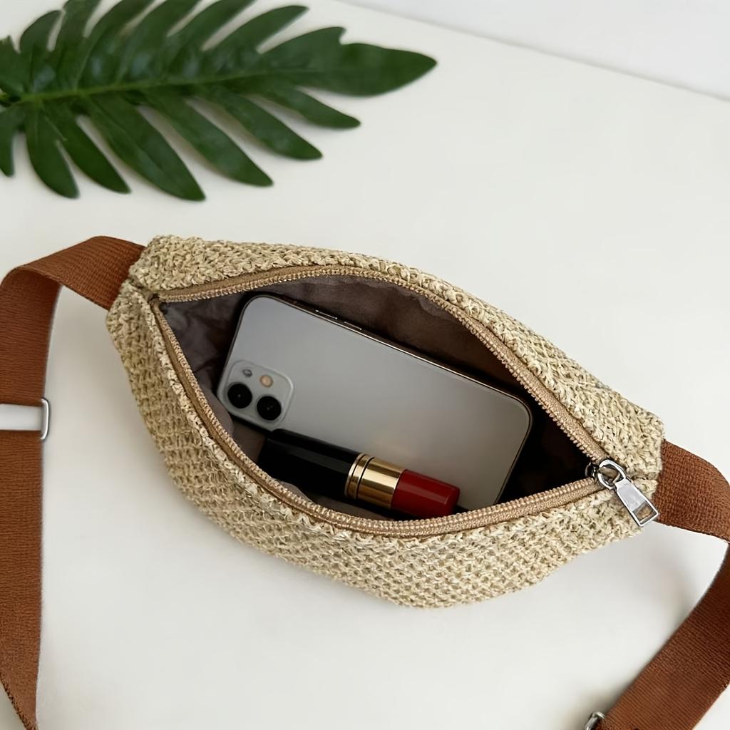 One ladies' straw waist bag with adjustable shoulder strap for crossbody wear, suitable for summer beach vacations and daily use