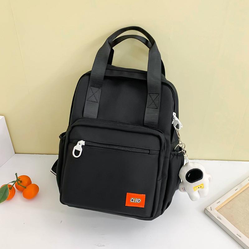 Unisex Primary School Student Backpack Waterproof Handbag With Colorful Patchwork Design